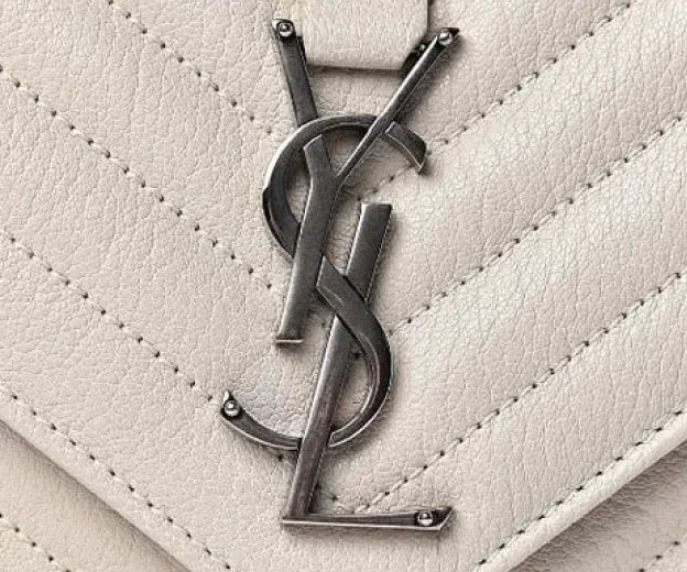 To authenticate a Saint Laurent bag pay attention to detail in logo and branding