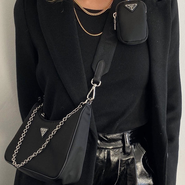 Is this a fake Prada cleo bag? The logo doesn't look like it is in the  center of the bag and the silver hardware (where the straps meet) look off  : r/NYCinfluencersnark