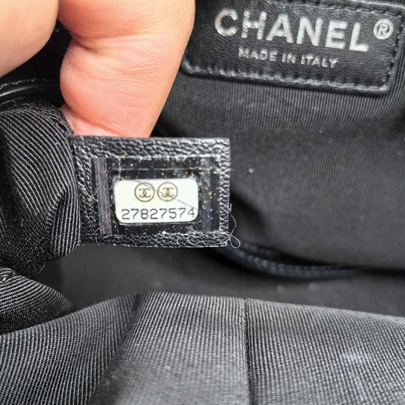 Chanel authenticity sticker inside a bag, beside the CHANEL MADE IN ITALY heat stamp