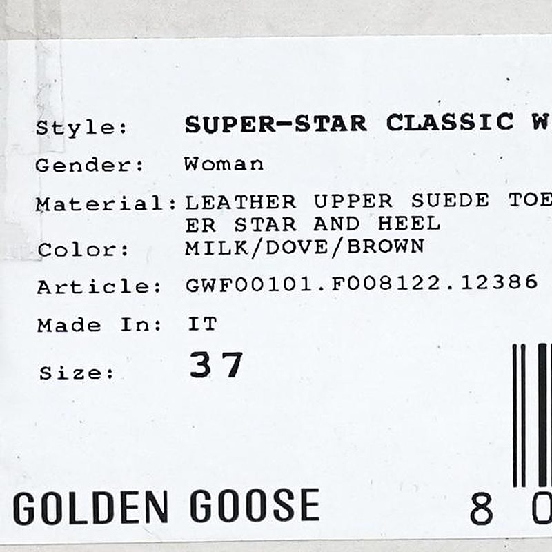 Een doosetiket van Golden Goose-schoenen met het artikelnummer GWF00101.F008122.12386 op de regel Article, onder de stijlnaam, het materiaal en de kleur
