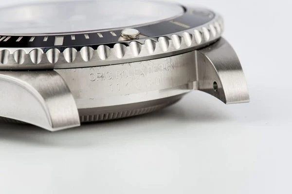 Rolex engraving between the case lugs, reading orig. Rolex design with the reference number